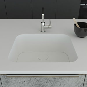 Küchenspüle PSE 550/480 mit Spülenboden und Designabdeckung aus Staron Bright White; eingebaut in eine Arbeitsplatte aus Staron Bright White mit einer Standarmatur