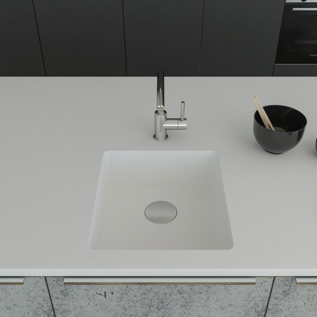 Gegossene Spüle B1177 mit Staronboden in Bright White mit Ablaufgarnitur AH1, welche separat bestell bar ist. Die Spüle ist in eine Arbeitsplatte in Bright White eingelassen. Breite 450 mm, Tiefe 500 mm
