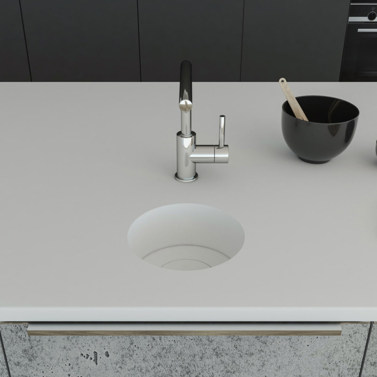 Küchenspüle rund PRSE199, Durchmesser 223 mm aus dem Mineralwerkstoff Staron in der Farbe Bright White mit einem Spülenboden aus Staron und einer Designabdeckung in Bright White. Die Spüle wurde in eine Arbeitsplatte auch aus Staron Bright White fugenlos 