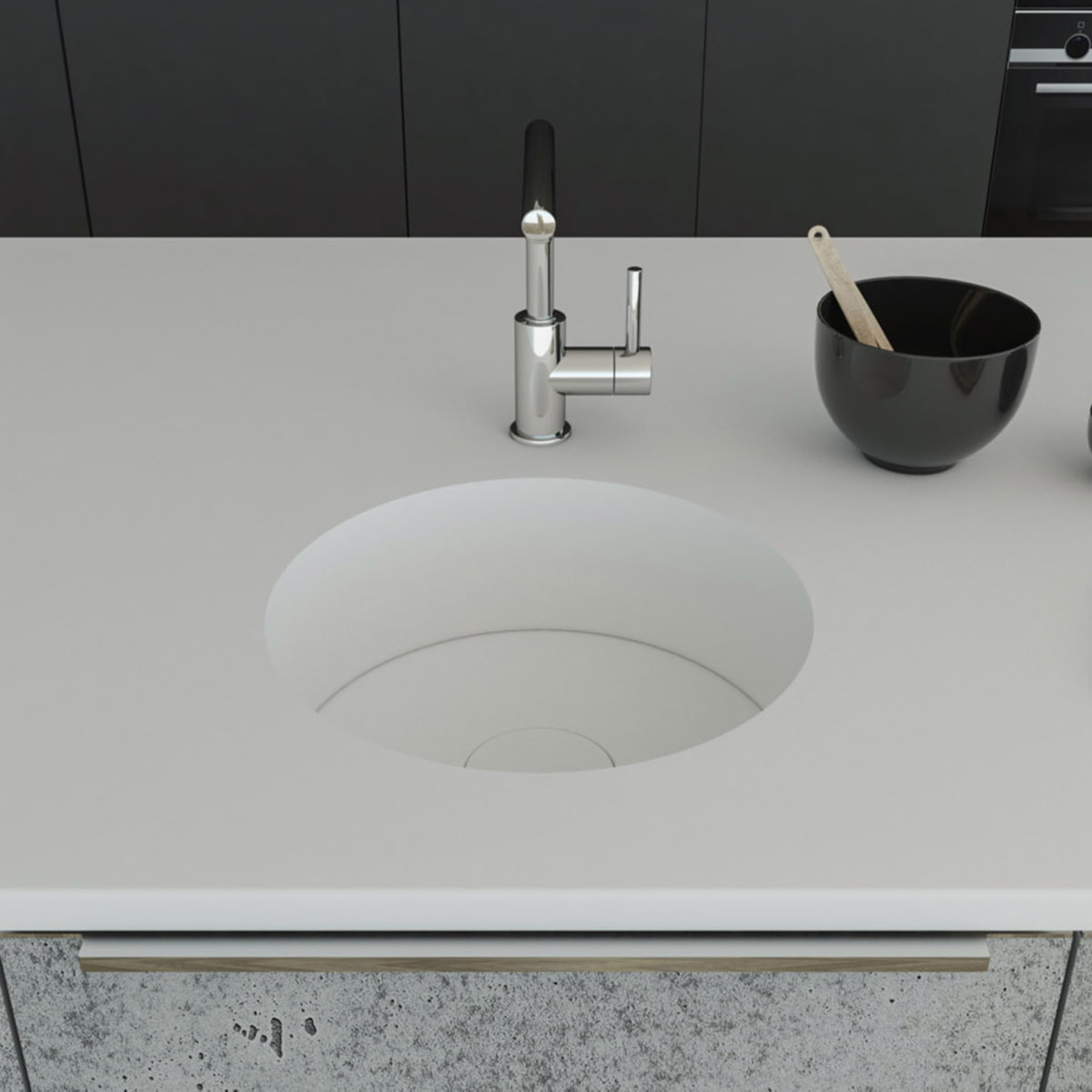 Küchenspüle rund PRSE380, Durchmesser 404 mm aus dem Mineralwerkstoff Staron in der Farbe Bright White mit einem Spülenboden und Designabdeckung aus Staron Bright White. Die Spüle wurde in eine Arbeitsplatte auch aus Staron Bright White fugenlos eingebaut