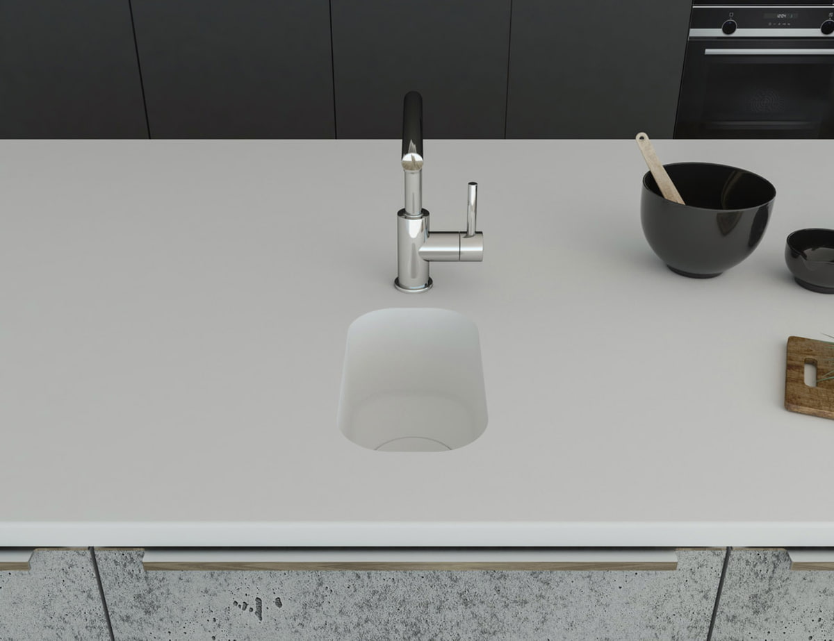 Küchenspüle PSE 162/300 aus Staron mit Spülenboden und Designabdeckung aus Staron Bright White. Fugenlos eingebaut in eine Arbeitsplatte aus Staron Bright White.