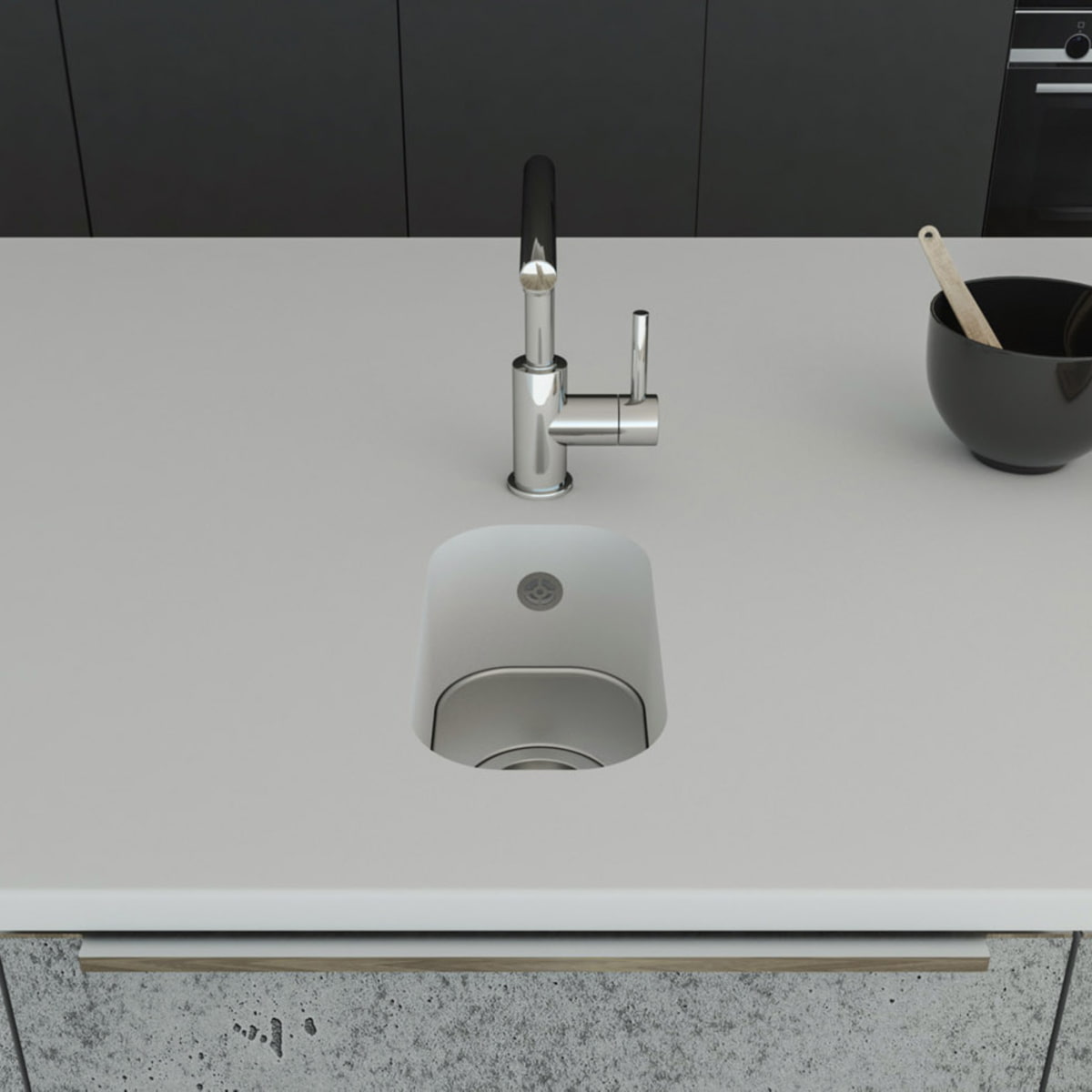 Küchenspüle PSE 162/300 aus Staron mit Spülenboden aus Edelstahl und einer Ablaufgarnitur. Fugenlos eingebaut in eine Arbeitsplatte aus Staron Bright White.