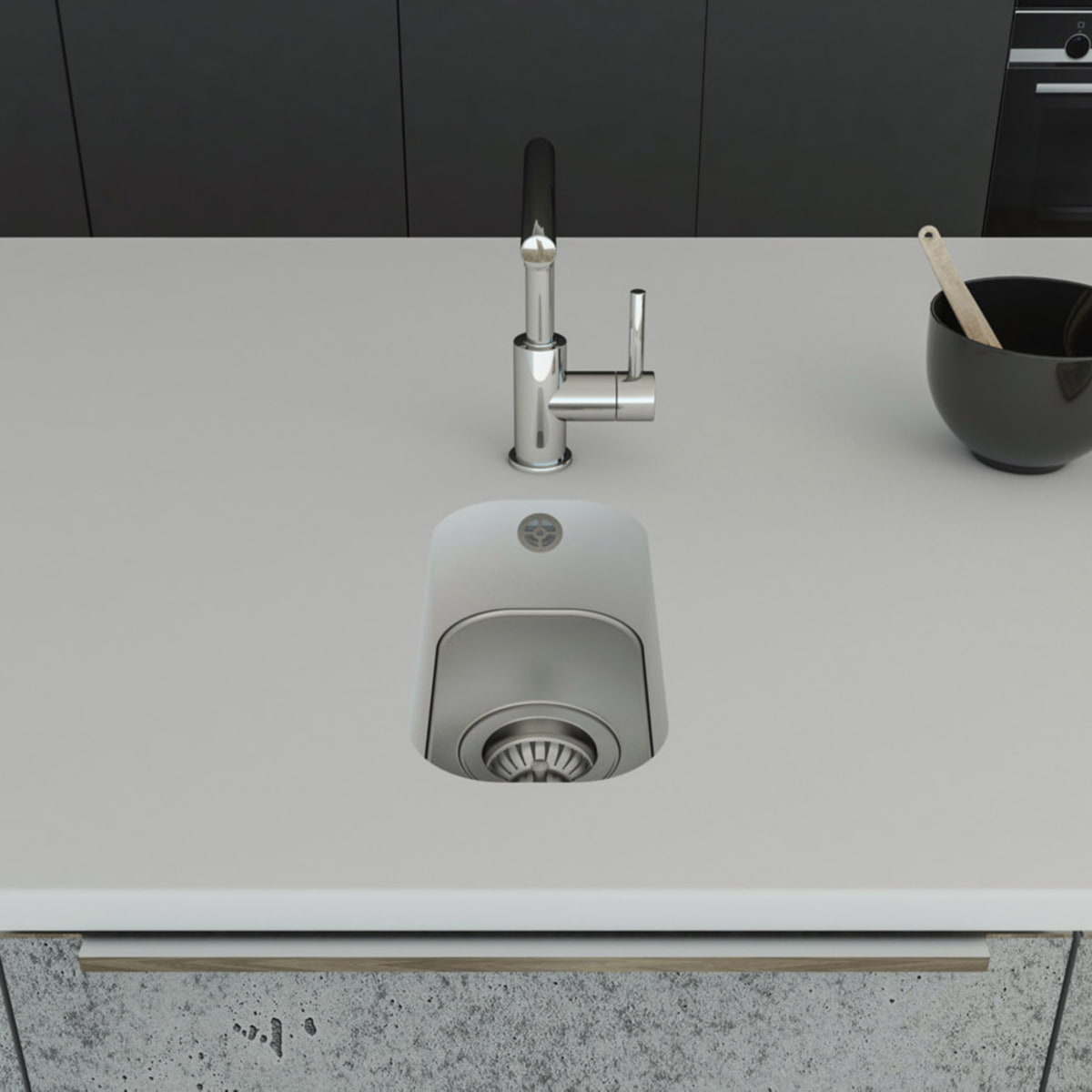 Küchenspüle PSE 162/352 aus Staron mit Spülenboden aus Edelstahl und einer Ablaufgarnitur. Fugenlos eingebaut in eine Arbeitsplatte aus Staron Bright White.