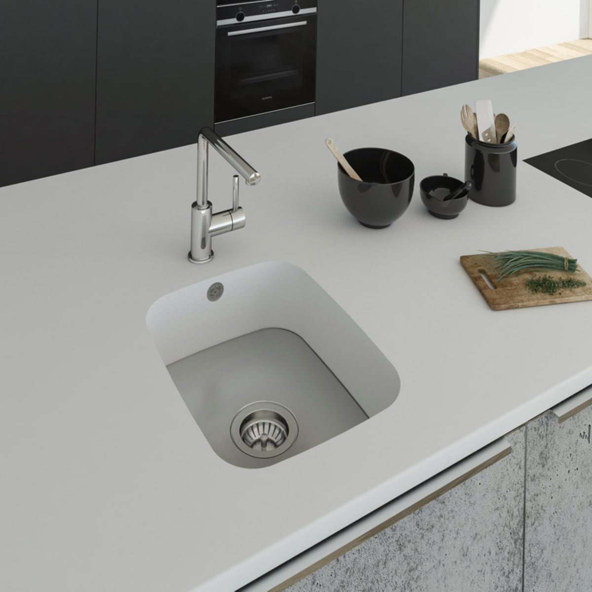 Küchenspüle PSE 332/418 aus Staron mit Spülenboden aus Edelstahl. Fugenlos eingebaut in eine Arbeitsplatte aus Staron Bright White.