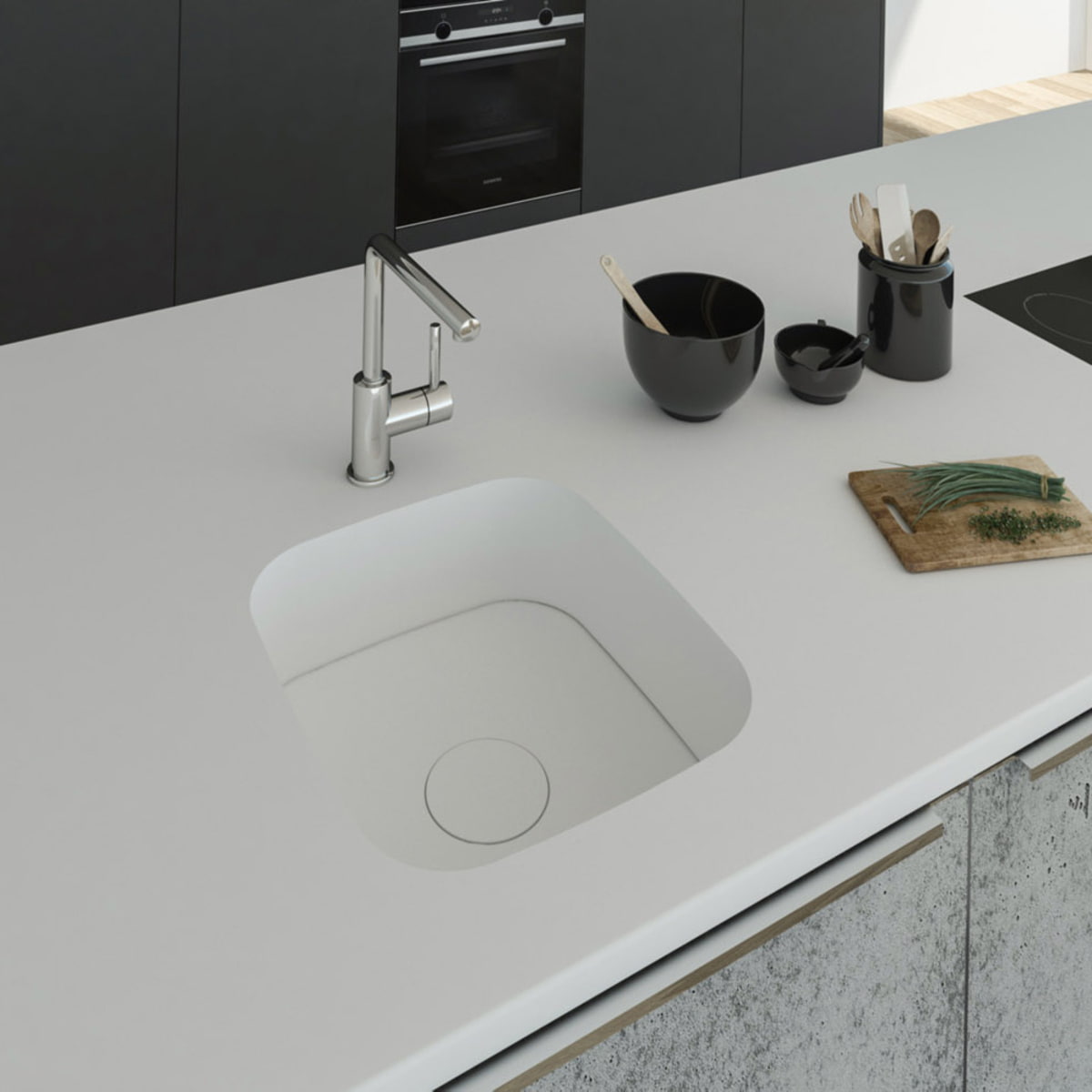 Küchenspüle PSE 375/420 aus Staron mit Spülenboden und Designabdeckung aus Staron Bright White. Fugenlos eingebaut in eine Arbeitsplatte aus Staron Bright White.