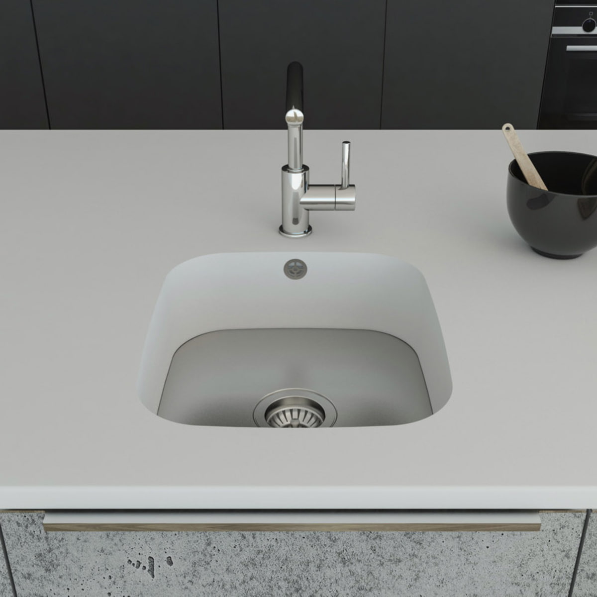 Küchenspüle PSE 332/418 aus Staron mit Spülenboden aus Edelstahl und einer Ablaufgarnitur. Fugenlos eingebaut in eine Arbeitsplatte aus Staron Bright White.