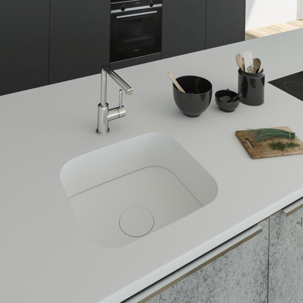 Küchenspüle PSE 450/400 mit Spülenboden und Designabdeckung aus Staron Bright White eingelassen in eine Arbeitsplatte aus Staron Bright White mit Standarmatur