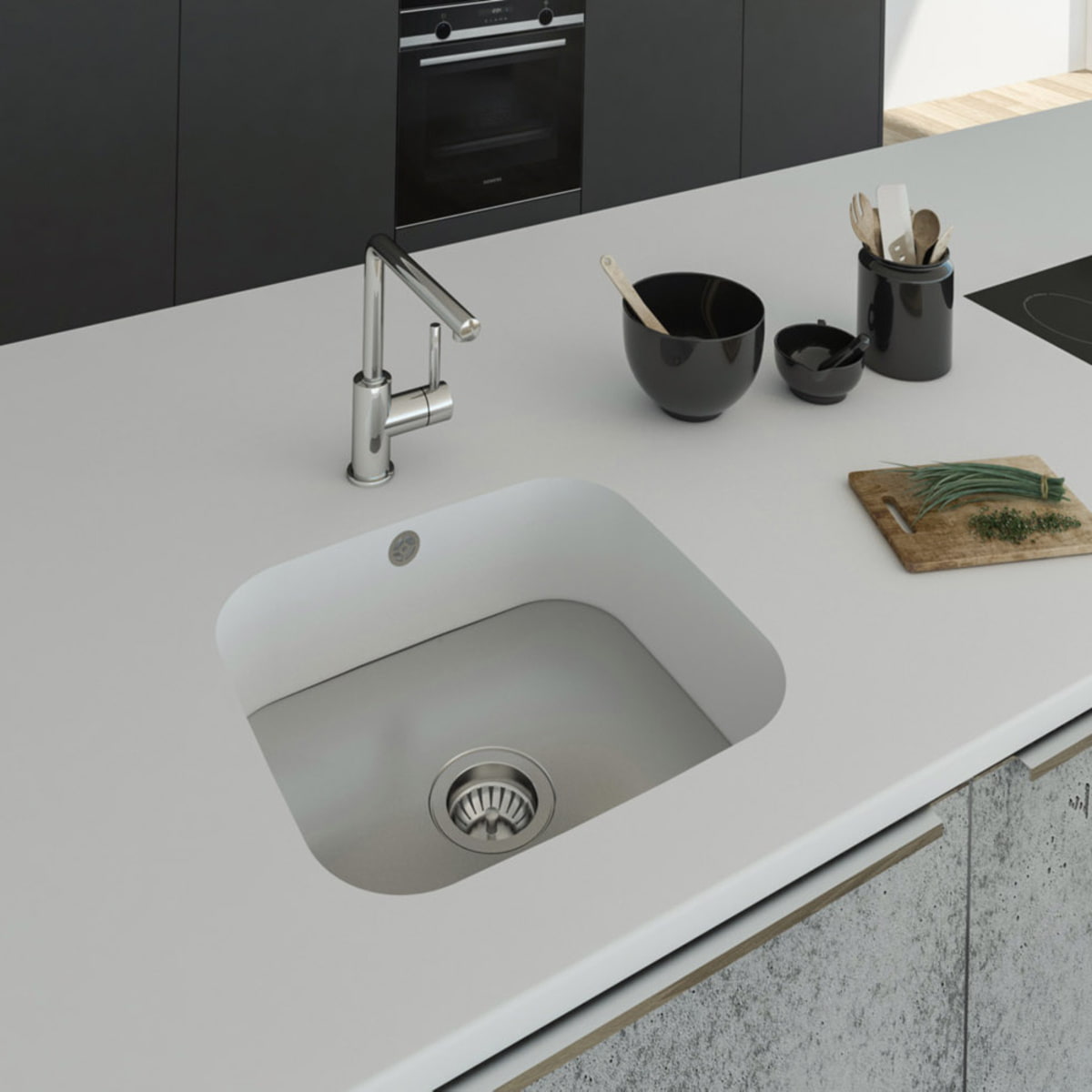 Küchenspüle PSE 450/400 mit Spülenboden aus Edelstahl eingelassen in eine Arbeitsplatte aus Staron Bright White mit Standarmatur