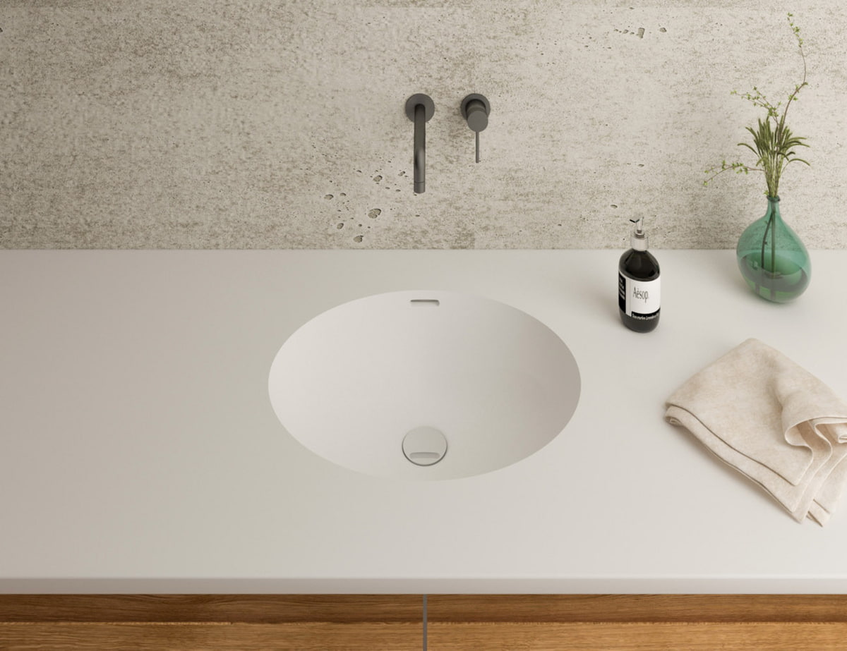 Gegossenes Becken A3181 Mineralwerkstoff Staron Bright White mit Universalventil eingelassen in Waschtischplatte in Bright White; Universalventil muss dazubestellt werden