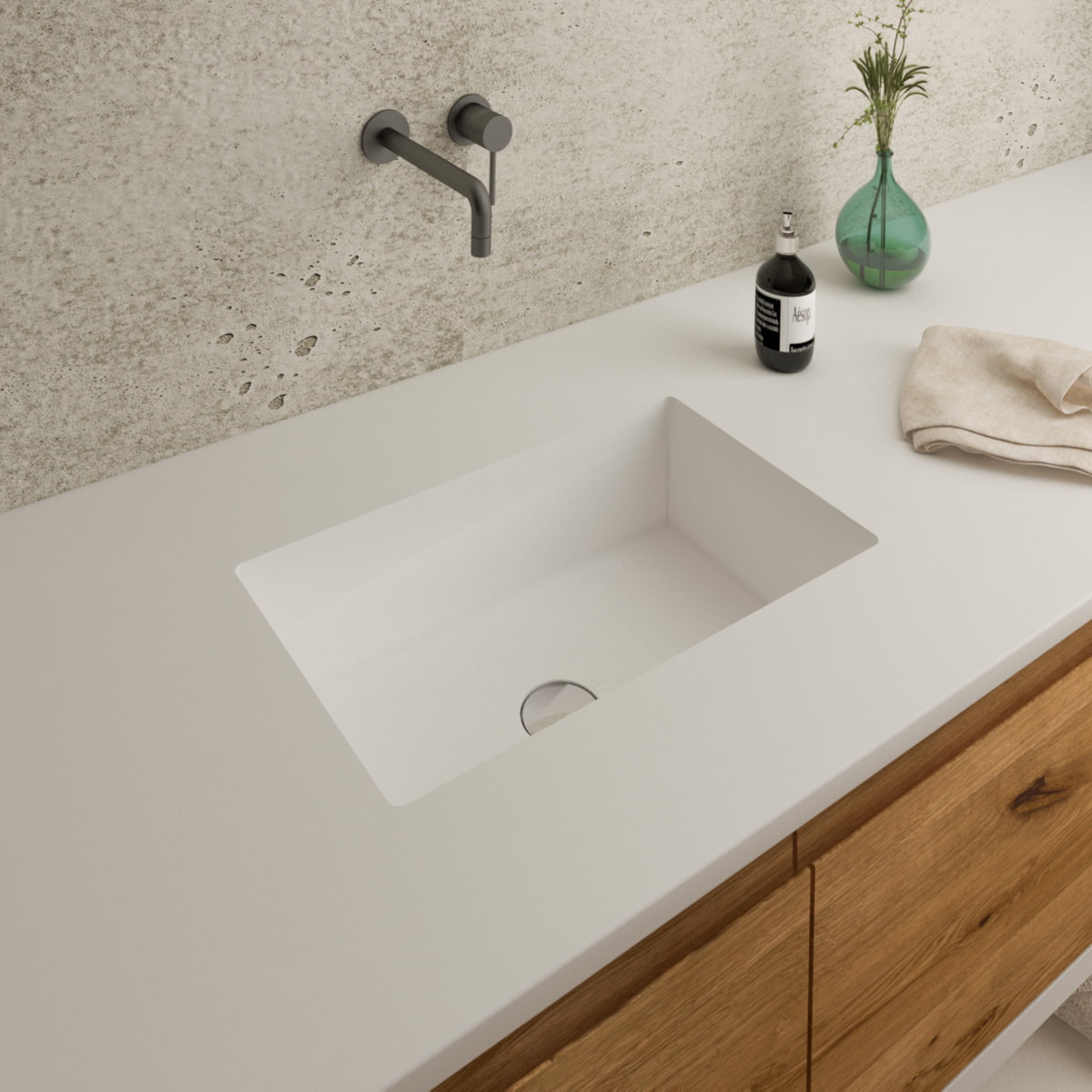 Gegossenes Becken Mineralwerkstoff Staron Bright White mit Universalventil eingelassen in Waschtischplatte in Bright White